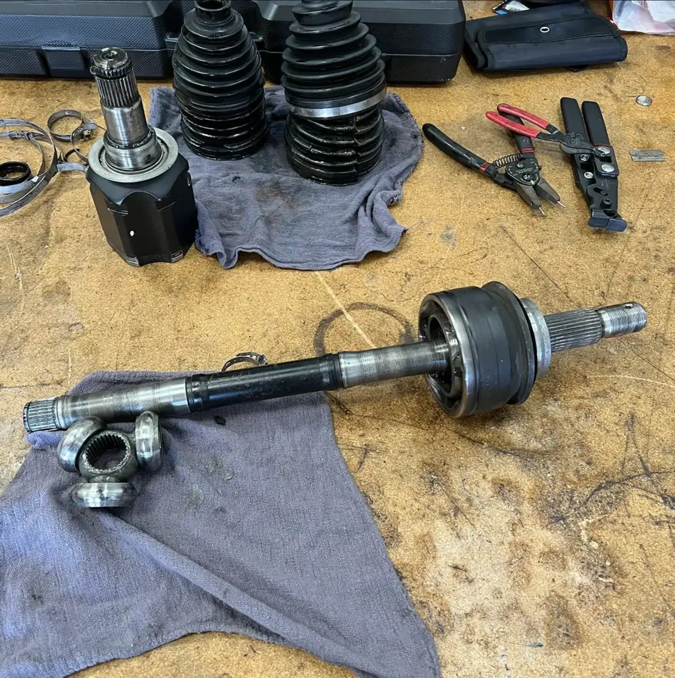 CV axle and suspension repair in progress at La Mesa Autoworks in La Mesa, California